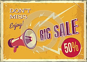 Vector vintage megaphone. Big sale poster with grunge texture. Retro megaphone on the orange background with place for