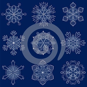 Vector vintage snowflake set in zentangle style. 9 original isolated snow flakes for Christmas, New Year decoration. Hand drawn d