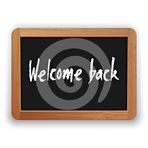 Vector Welcome Back Phrase on a Blackboard photo