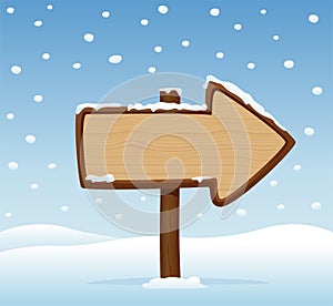 Vector wooden arrow signboard on snowy background.
