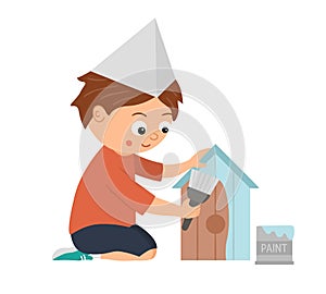 Vector working boy. Flat funny sitting kid character painting a nestling box. Craft lesson illustration.