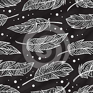Vector zendoodle feathers seamless pattern on a chalkbord background