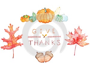 Vectorized hand painted watercolor of autumn leaves, acorns, squash, and the words give thanks. photo