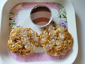 Veg cutlets in a plate. Cabbage cutlets receipe served in a plate. Indian receipe veg cutlet close up view.