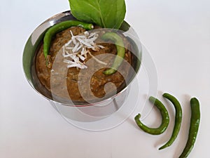 Veg. Hyderabadi curry on a plain white background