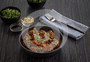 Veg manchurian served in a bowl