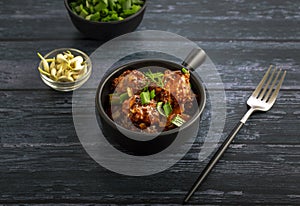 Veg manchurian served in a bowl