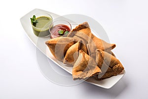 Veg Samosa is a triangle shape pakora stuffed with Aloo sabji