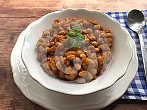 Vegan bean goulash with paprika and marjoram.