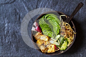 Vegan bowl with avocado and tofu