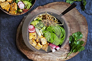 Vegan bowl with avocado and tofu