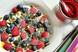 Vegan breakfast with berries and tea