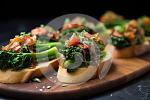 vegan bruschetta topped with broccoli raab and caramelized onion photo