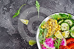 Vegan buddha bowl. Bowl with fresh raw vegetables