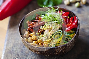 Vegan Buddha bowl with vegetables and chickpeas