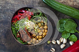 Vegan Buddha bowl with vegetables and chickpeas