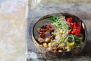 Vegan Buddha bowl with vegetables and chickpeas