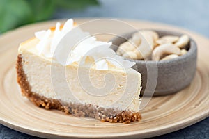 Vegan cashew cheesecake with coconut flakes