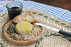 Vegan cheese plate and its various ingredients.