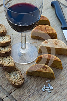 Vegan cheeses on a wooden table