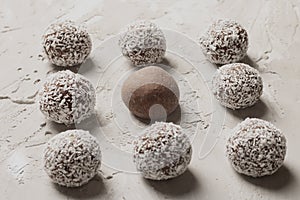 Vegan chocolate balls with coconut, healthy breakfast