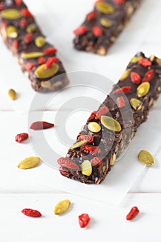 Vegan chocolate bars, goji berries.