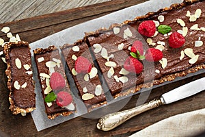 Vegan chocolate tart with almonds