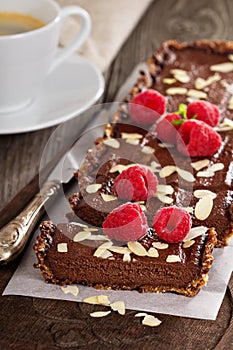 Vegan chocolate tart with almonds