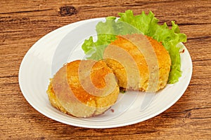 Vegan cuisine - Potato cutlet in the plate