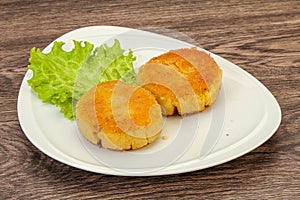 Vegan cuisine - Potato cutlet in the plate