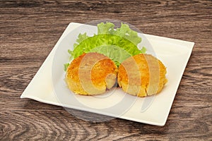 Vegan cuisine - Potato cutlet in the plate