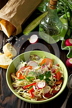 Vegan dish. Proper nutrition. Healthy lifestyle. Summer vitamin salad with fresh vegetables dressing olive oil