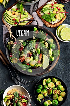 Vegan dishes assortment on gray background