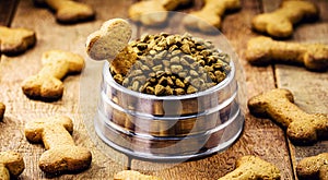 Vegan dog biscuit enriched with omega 3, healthy homemade food for puppies, rustic wooden background
