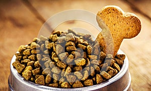 Vegan dog biscuit enriched with omega 3, healthy homemade food for puppies, rustic wooden background