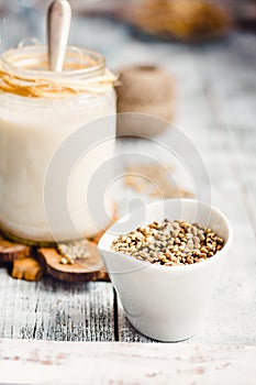Vegan fresh milk from hemp seeds in a glass jar
