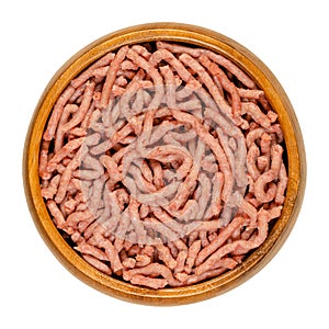 Vegan ground meat, a substitute for minced meat, in a wooden bowl