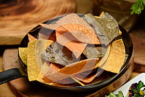 Vegan homemade Doritos Chips in a bowl.