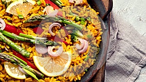 Vegan Paella on gray background