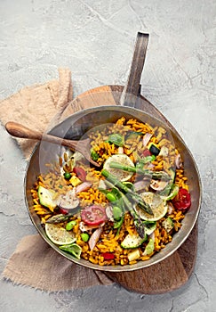 Vegan Paella on gray background