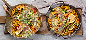 Vegan Paella on gray background