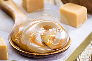 vegan pasty milk candy, caramel made with unsweetened coconut milk, healthy candy, called dulce de leche photo