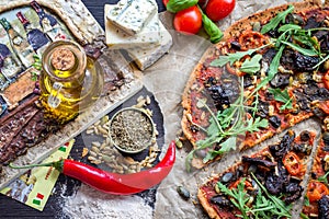 Vegan pizza with spelt dough flat lay view