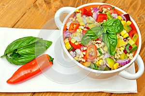 Vegan salad with kamut and fresh , raw veggies