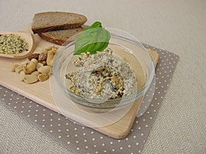 Vegan spread from peeled hemp seeds, nuts and herbs
