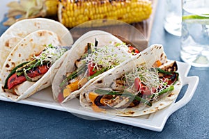 Vegan tacos with grilled tofu and vegetables