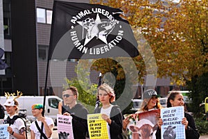 Vegan and vegetarians for animal liberation protest at a demonstration against cruelty towards animals and eating meat and dairy p