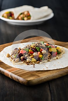 Vegan wraps with lentil, chickpea peppers and kidney bean