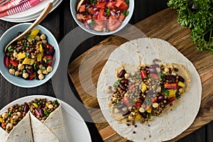 Vegan wraps with lentil, chickpea peppers and kidney bean