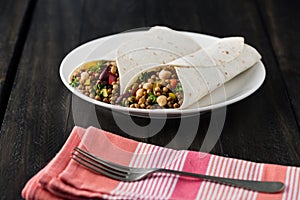 Vegan wraps with lentil, chickpea peppers and kidney bean